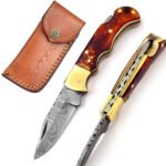 Damascus Handmade Folding Knife resin of red color with brass bolster